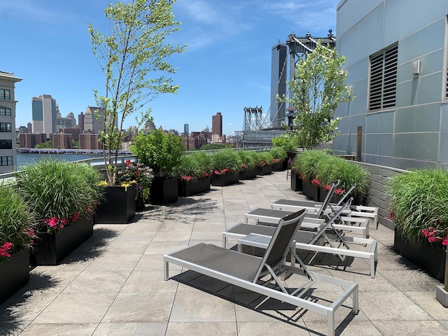 view of patio / terrace featuring a view of city