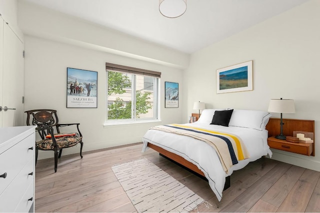 bedroom featuring light hardwood / wood-style floors