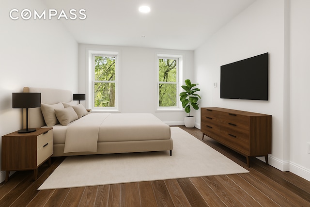 47 W 94th St, New York City, NY 10025 - bedroom with baseboards and dark wood-style flooring