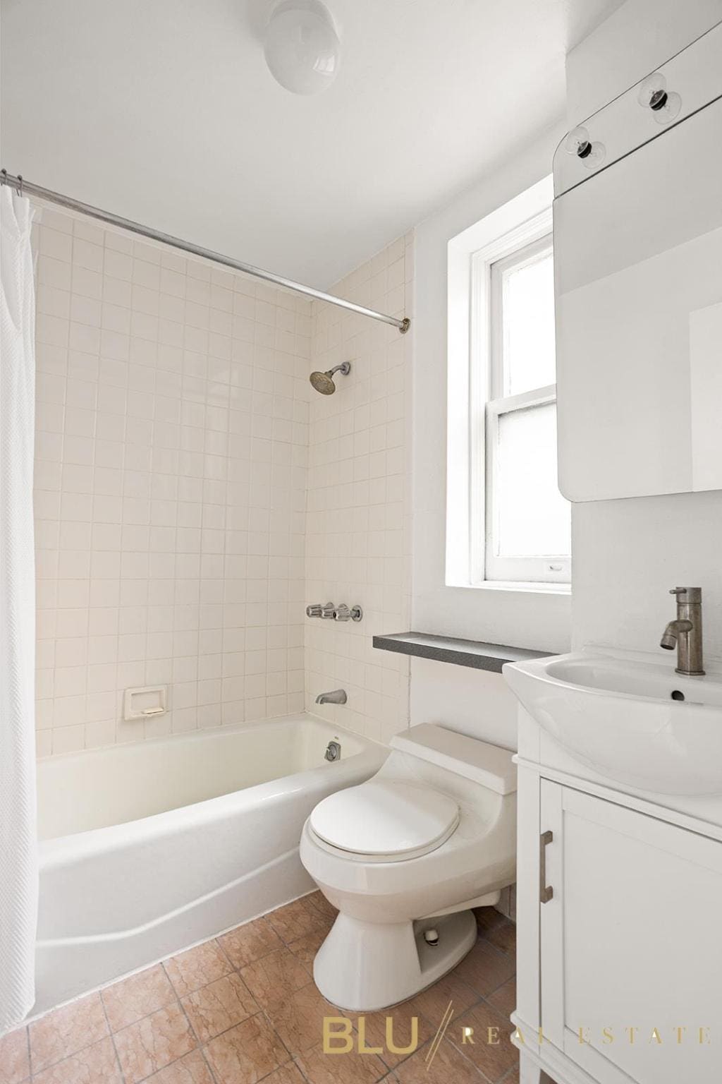 full bathroom with toilet, shower / bath combo, and vanity