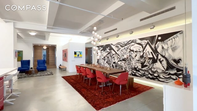 dining room with concrete flooring