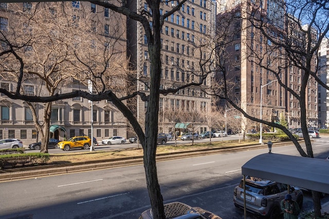 799 Park Ave Unit 2B, New York City, NY 10021 - view of asphalt road with sidewalks, curbs, and street lighting