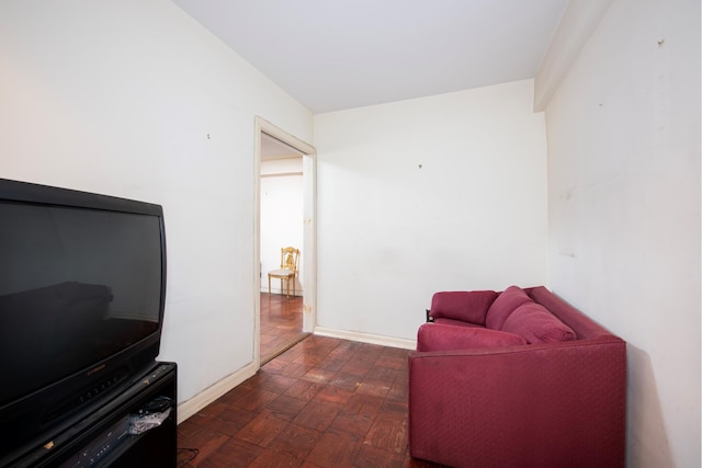 799 Park Ave Unit 2B, New York City, NY 10021 - living area featuring dark wood-style floors and baseboards