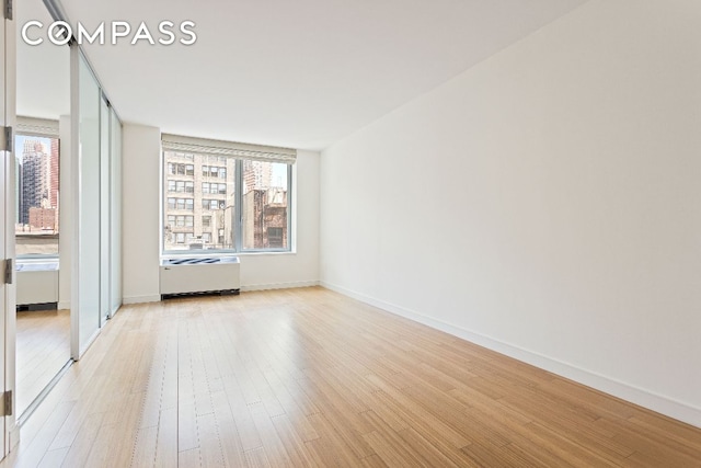 empty room featuring light wood-type flooring