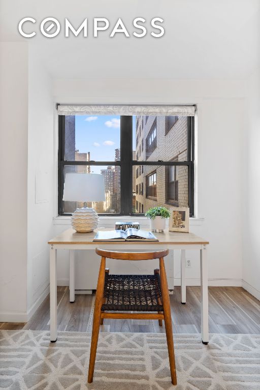 dining area with light hardwood / wood-style floors