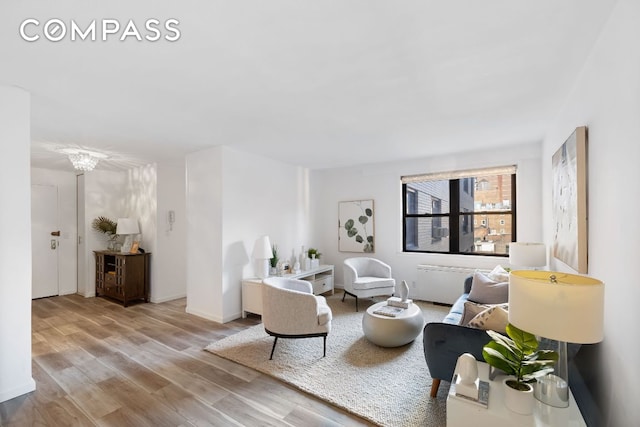 living room with light hardwood / wood-style flooring