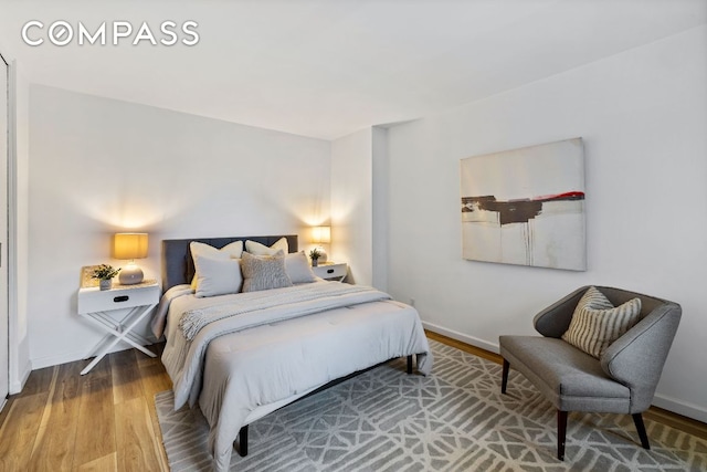 bedroom featuring hardwood / wood-style floors