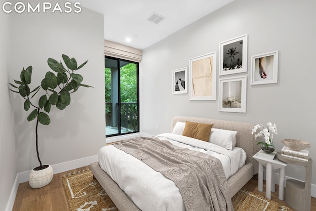 bedroom featuring hardwood / wood-style floors