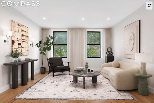 sitting room with light hardwood / wood-style flooring