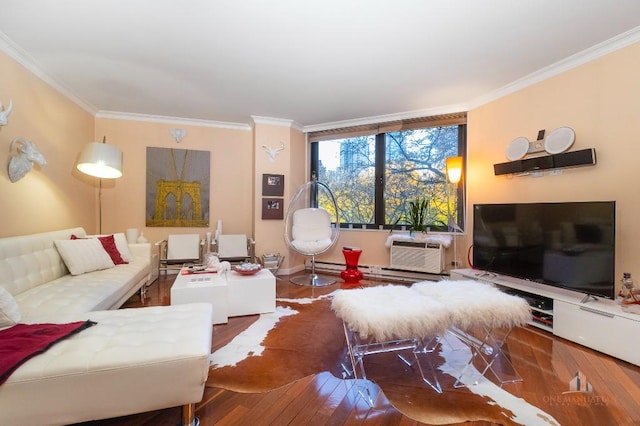 living room with ornamental molding and hardwood / wood-style floors