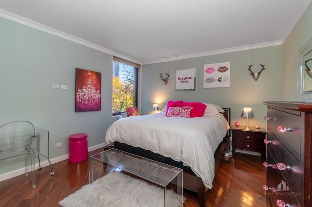 bedroom featuring dark hardwood / wood-style floors and ornamental molding