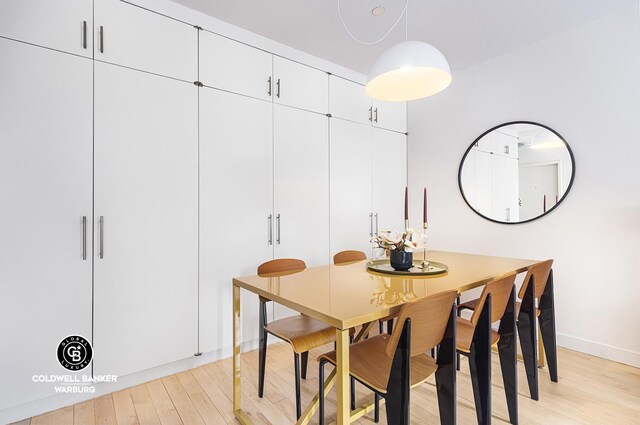 dining space featuring light hardwood / wood-style flooring