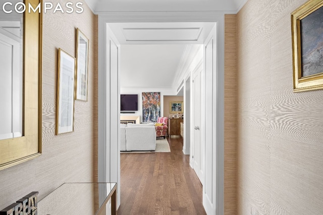 corridor with crown molding and dark hardwood / wood-style floors