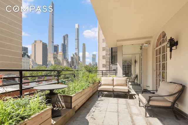 1 E 62nd St Ph, Ph, New York City, NY 10065 - balcony with a skyline view and outdoor lounge area