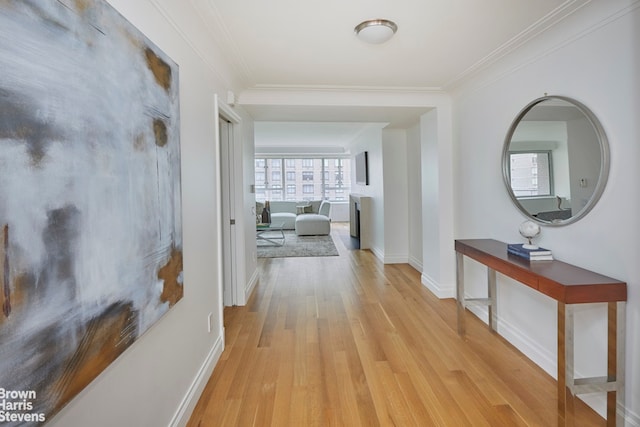 200 E 66th St Unit B1804, New York City, NY 10065 - corridor featuring light wood-style flooring, crown molding, and baseboards
