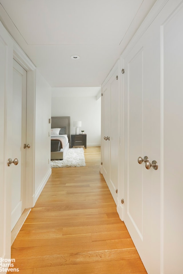 200 E 66th St Unit B1804, New York City, NY 10065 - corridor with light wood-style flooring and baseboards