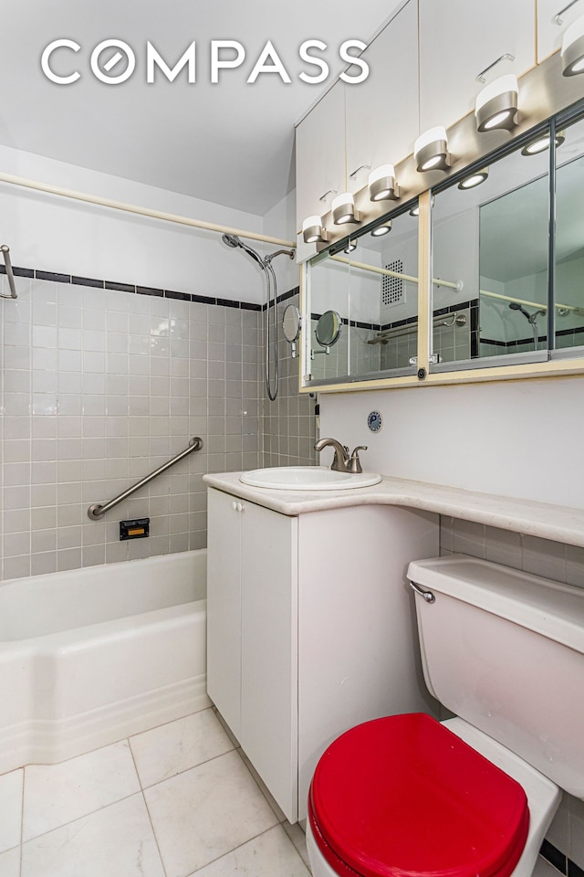 221 E 50th St Unit 8A, New York City, NY 10022 - bathroom with shower / bath combination, toilet, vanity, and tile patterned flooring