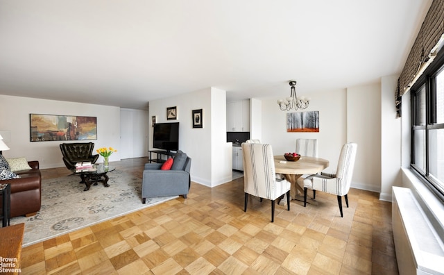 dining room featuring an inviting chandelier