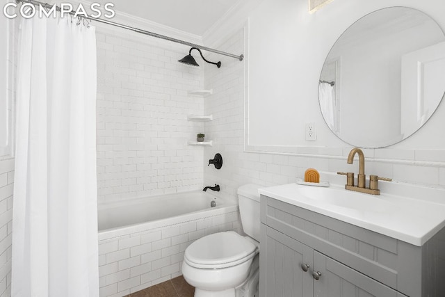 full bathroom with vanity, ornamental molding, shower / bath combo, and toilet