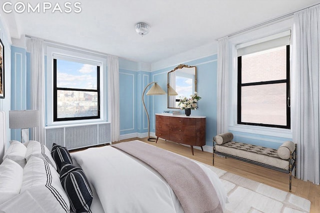 bedroom featuring light hardwood / wood-style floors