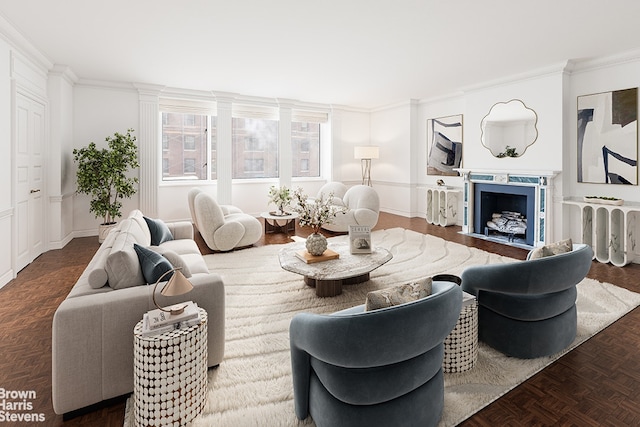 living area with a fireplace and crown molding