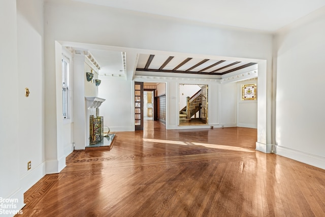 spare room with hardwood / wood-style floors