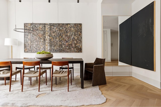 dining room featuring baseboards