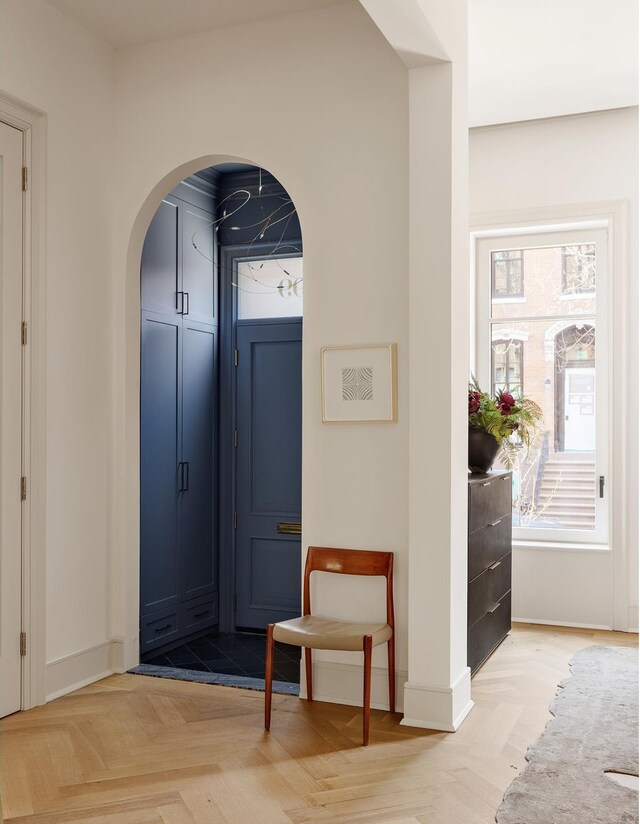 office area with light hardwood / wood-style floors