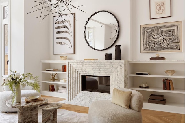 living area featuring light parquet floors