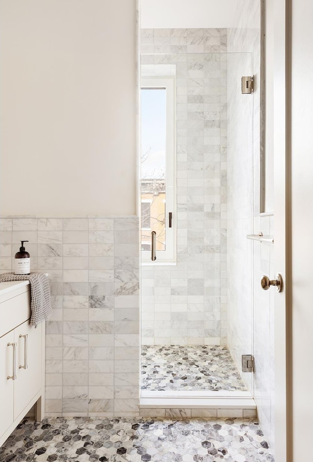 bathroom featuring a stall shower