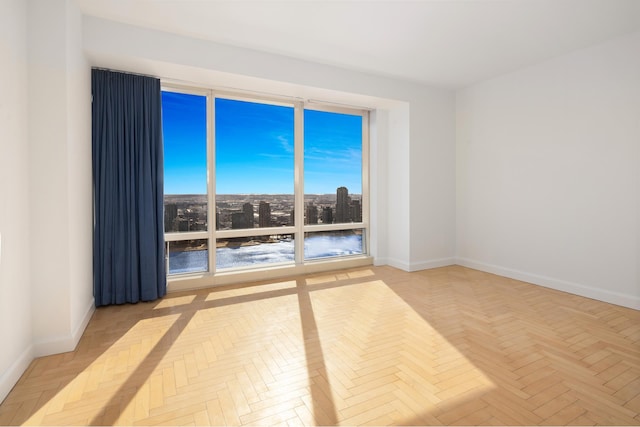 empty room with baseboards