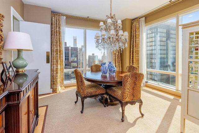 carpeted dining space featuring an inviting chandelier