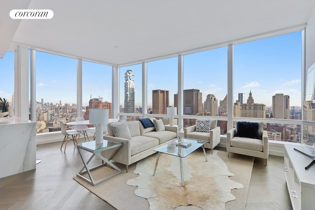 sunroom / solarium with a city view and visible vents