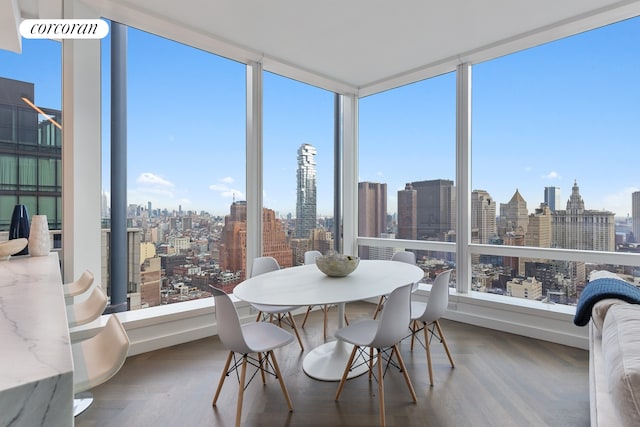 sunroom / solarium with a view of city