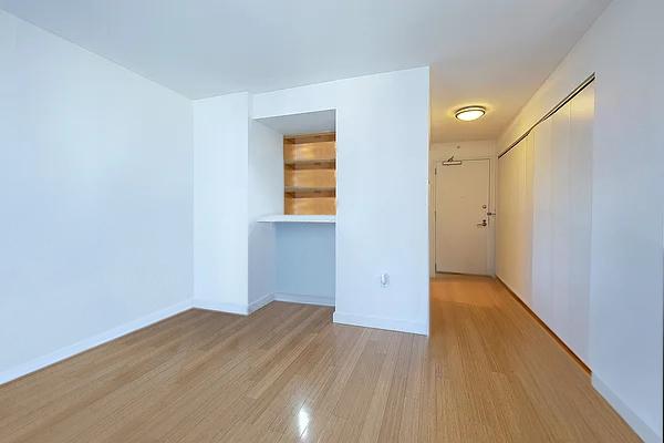 spare room featuring light hardwood / wood-style flooring