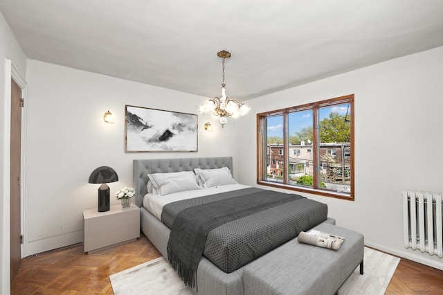 283 Bay 14th St, New York City, NY 11214 - bedroom featuring radiator heating unit, a chandelier, and baseboards