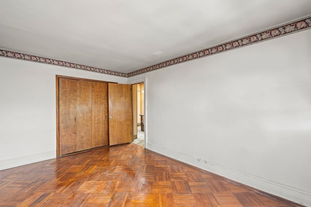 283 Bay 14th St, New York City, NY 11214 - unfurnished bedroom with baseboards and a closet