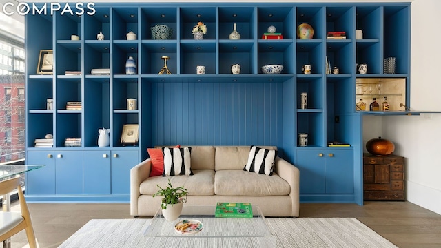 sitting room featuring wood-type flooring