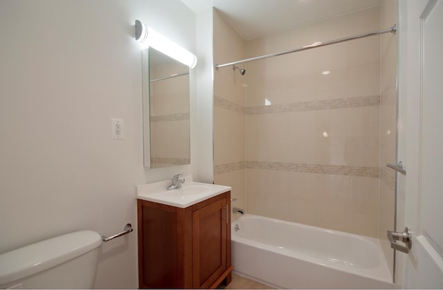 bathroom with vanity, toilet, and tub / shower combination