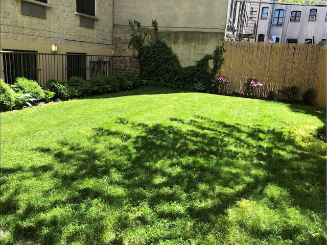 view of yard featuring fence