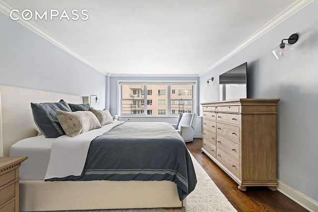 bedroom featuring ornamental molding, dark wood-style flooring, and baseboards