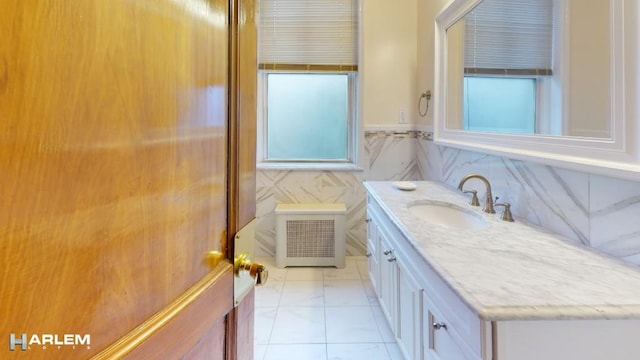 bathroom with wainscoting and vanity