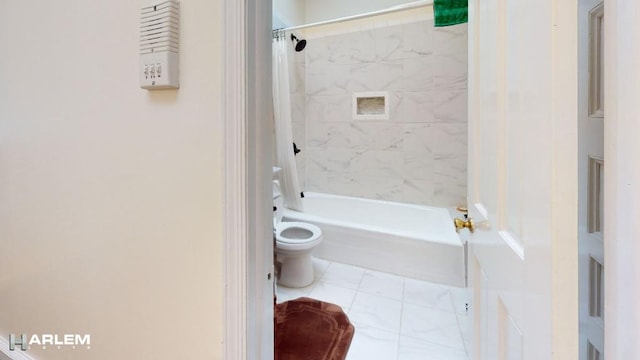 bathroom with shower / bath combination with curtain and toilet