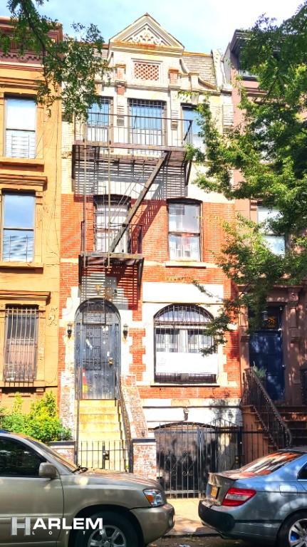 view of property with stairway