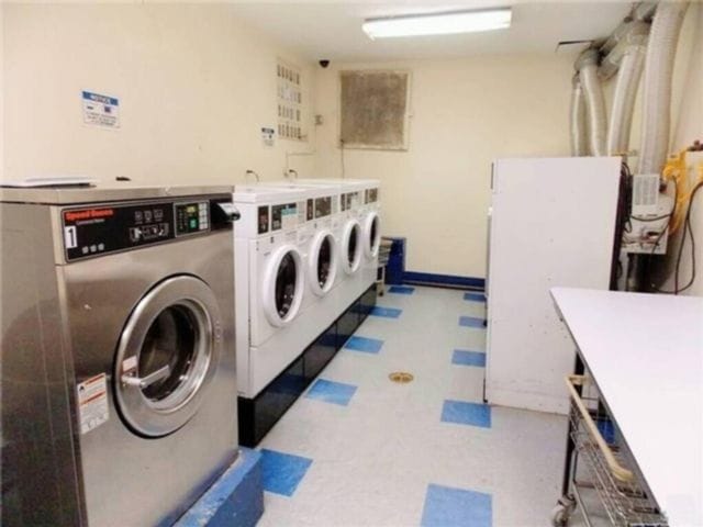 laundry room with separate washer and dryer