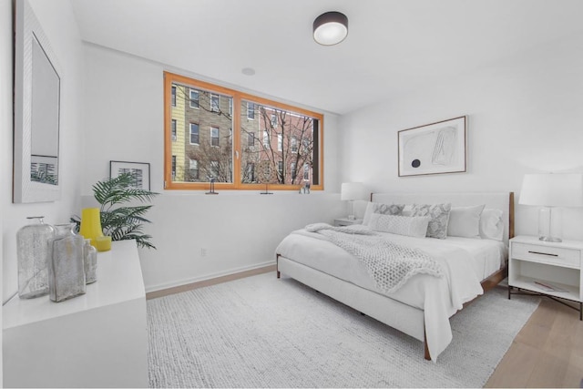 bedroom featuring hardwood / wood-style floors