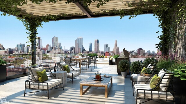 view of patio featuring a pergola