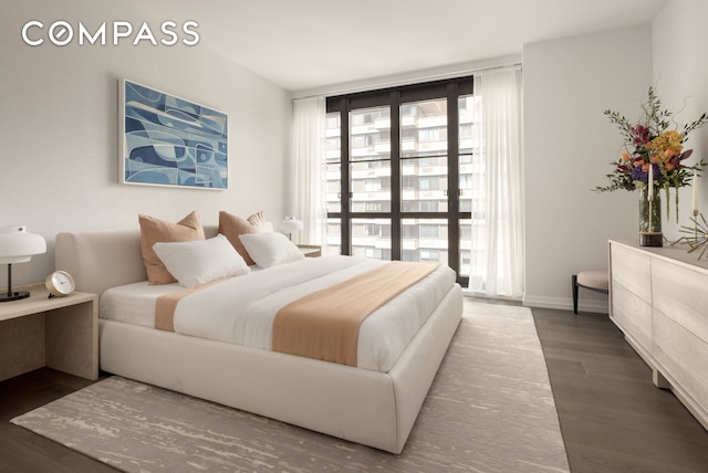 bedroom featuring wood finished floors