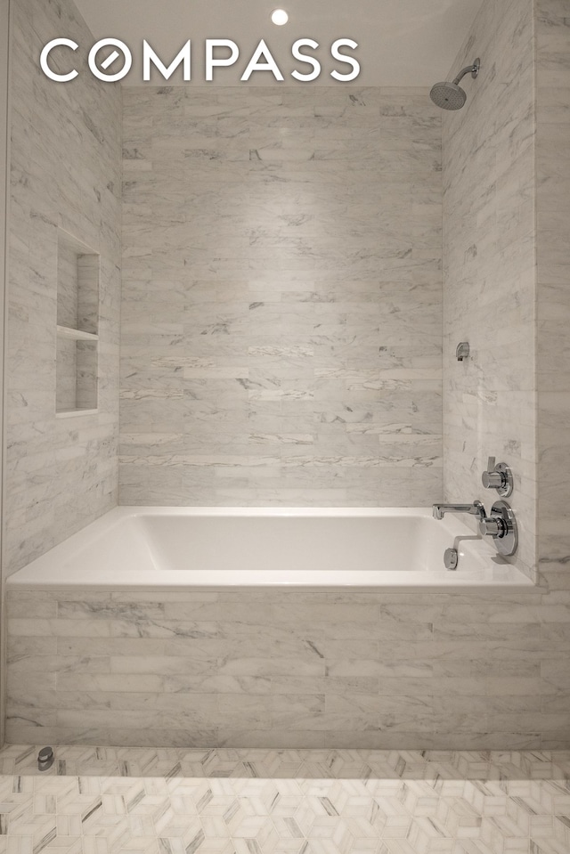 full bath featuring bathtub / shower combination