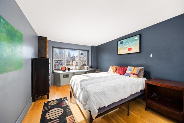 bedroom featuring light hardwood / wood-style floors